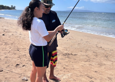 Lokelani teacher learning to fish at Kalepolepo